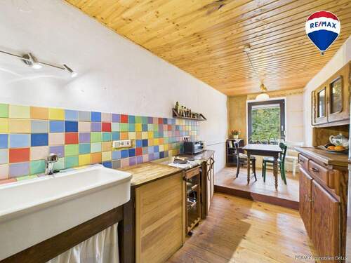 RE/MAX Immobilien DeLux Einfamilienhaus Mettlach-Dreisbach Küche - 