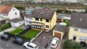 Strassenansicht - Einfamilienhaus mit zwei separaten Wohneinheiten in guter Lage