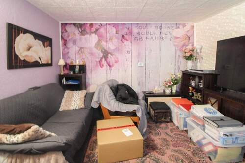 Wohnzimmer - 4 Zimmer Einfamilienhaus zum Kaufen in Hettstedt