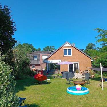 Haus_Gartenansicht - Modernisiertes Einfamilienhaus mit vollwertiger Einliegerwohnung und großem Garten