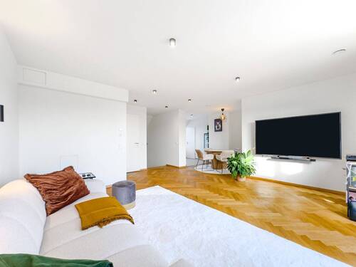 Wohnzimmer - Stilvolle Maisonette-Penthousewohnung in zentraler Stadtlage