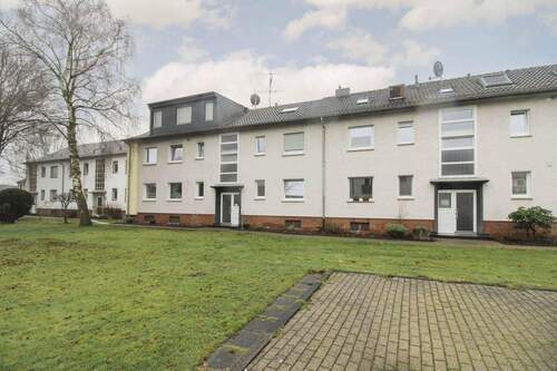Hausansicht - Gepflegte Erdgeschosswohnung mit Gemeinschaftsgarten in Rheinberg.Ossenberg