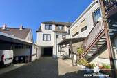 Hofansicht - 1 Zimmer Mehrfamilienhaus, Wohnhaus zum Kaufen in Rüsselsheim