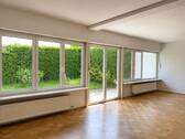 Wohnzimmer - Charmante Doppelhaushälfte mit Garten in begehrter Lage von München