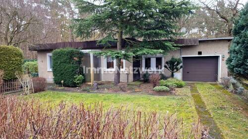 Bild 1 - Idyllisches Wohnen: Bungalow direkt am Wald