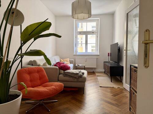 Wohnzimmer - Etagenwohnung mit 78,50 m&sup2; in München zum Kaufen