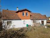 Blick vom Garten aufs Haus - Einfamilienhaus mit 71,00 m² in Coburg zum Kaufen