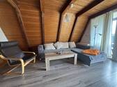 Wohnzimmerbereich - Mehrfamilienhaus, Wohnhaus mit 78,00 m&sup2; in Butjadingen / Fedderwardersiel zum Kaufen