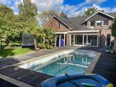 Pool- und Außenansicht - Luxuriöses Einfamilienhaus mit Pool, High-End-Technik & flexibler Raumgestaltung in Münster-Wienburg