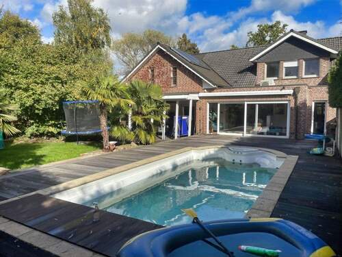 Pool- und Außenansicht - Luxuriöses Einfamilienhaus mit Pool, High-End-Technik & flexibler Raumgestaltung in Münster-Wienburg