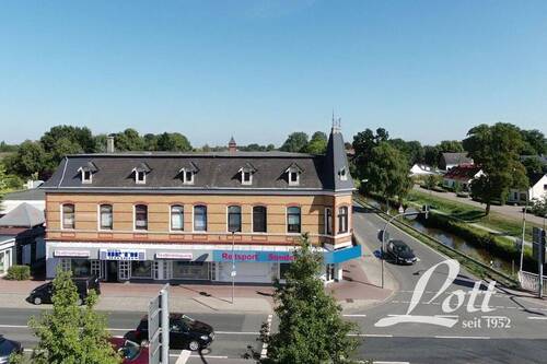 Bild 2 - Mehrfamilienhaus, Wohnhaus zum Kaufen in Apen / Augustfehn