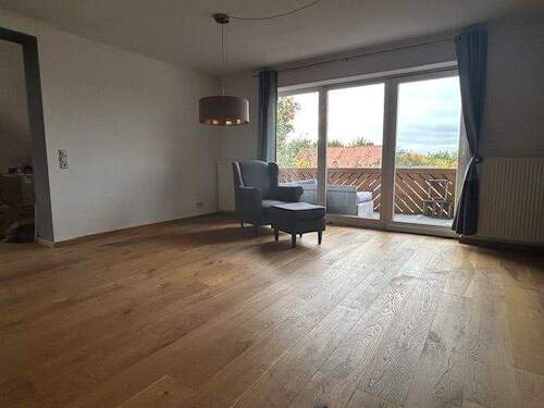 Wohnzimmer mit Blick auf südwest Balkon - 
