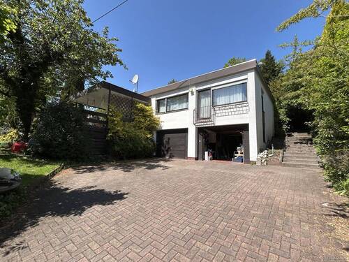 EB-25-MRBD-188 - Sanierungsbedürftiger Bungalow aus Nachlass mit Wintergarten und 2 Garagen - aktuell vermietet