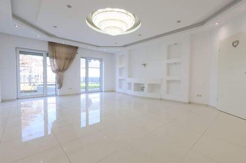 Wohnzimmer - 7 Zimmer Mehrfamilienhaus, Wohnhaus zum Kaufen in Rotenburg (Wümme)