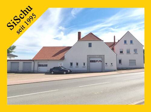 Exposé2 - Wohn- und Geschäftshaus mit kleinem KFZ- Gewerbe