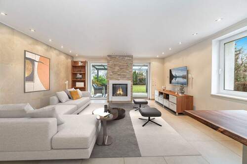 Wohnzimmer EG mit Staging - 6 Zimmer Einfamilienhaus zum Kaufen in München