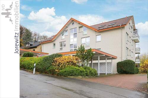 001 - Seitenansicht - Terrassenwohnung in bevorzugter Hanglage der Sieker-Schweiz, Garten inklusive