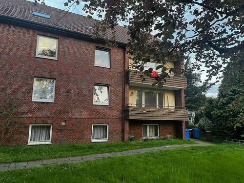 Rückansicht - 1 Zimmer Mehrfamilienhaus, Wohnhaus zum Kaufen in Nordenham
