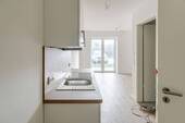Blick aus Küche Richtung Wohnbereich - 1 Zimmer Etagenwohnung zur Miete in Dörphof