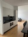 Diele mit EBK zum Wohnraum - 
