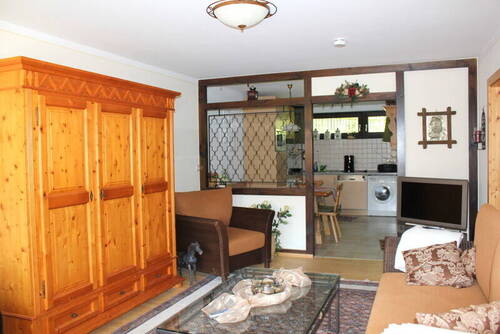 Wohnzimmer - Terrassenwohnung mit 55,70 m² in Schliersee zum Kaufen