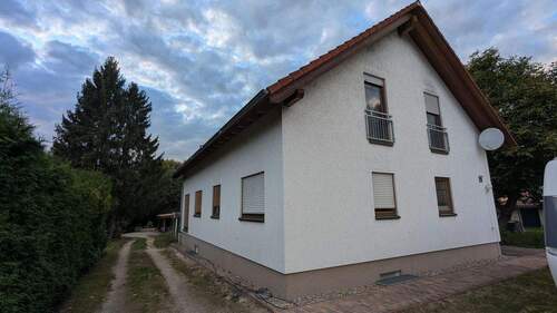 Bild 3 - 7 Zimmer Mehrfamilienhaus, Wohnhaus in Zühlsdorf