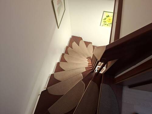 Treppe zum wohnlich ausgebauten Dachboden - 