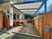 überdachte Terrasse - 7 Zimmer Mehrfamilienhaus, Wohnhaus zum Kaufen in Lage