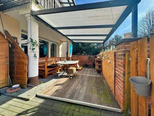 überdachte Terrasse - 7 Zimmer Mehrfamilienhaus, Wohnhaus zum Kaufen in Lage