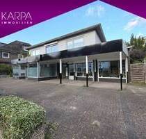 Mehrfamilienhaus mit 2 Ladenflächen in Hamburg Marienthal