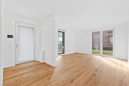 Blick auf die Eingangstür und den Wohnbereich - Etagenwohnung mit 116,00 m&sup2; in Hamburg zum Kaufen