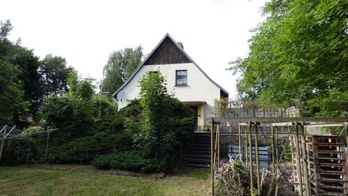 Ansicht Süd mit Abgang zum Garten - 