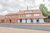 Außenansicht - 1 Zimmer Mehrfamilienhaus, Wohnhaus zum Kaufen in Drochtersen
