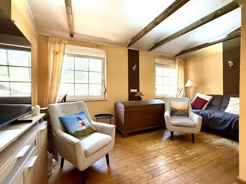 Wohnzimmer - 2 Zimmer Einfamilienhaus zum Kaufen in Lotte