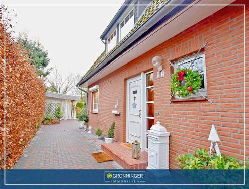 Hausansicht - 4-Zi.- Doppelhaustraum mit Wintergarten, Kamin, Sauna, Carport und Garten in ruhiger Sackgassenlage