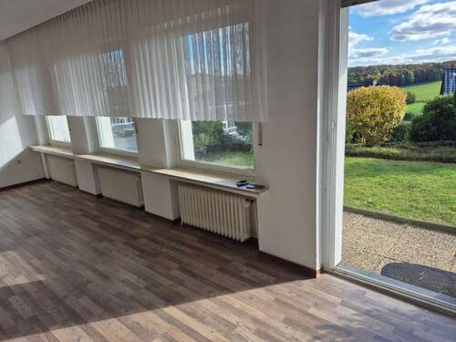 Wohnzimmer mit Terassenaussicht 2. Wohnung - 