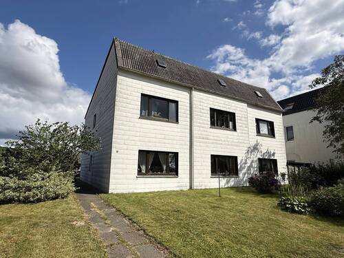 Frontansicht - Mehrfamilienhaus in der Marsch mit 4 Wohneinheiten