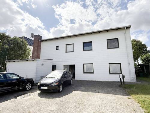 Rückansicht - 1 Zimmer Mehrfamilienhaus, Wohnhaus in Haseldorf