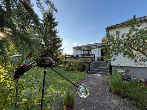 Außenaufnahme Blick auf die Terrasse - Bungalow mit 85,00 m&sup2; in Erfurt zum Kaufen