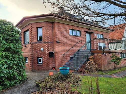 Front - Das etwas andere Rotklinkerhaus