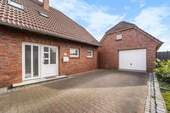 Auffahrt - Einfamilienhaus mit 138,00 m² in Krummhörn zum Kaufen
