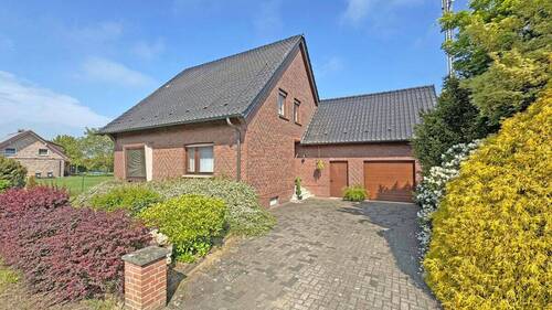 Außenansicht - Gepflegtes Einfamilienhaus mit großem Grundstück und möglicher Neubauperspektive in Voerde-Stockum!