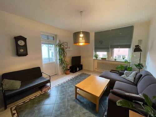 Wohnzimmer in der Wohnung im 1.OG - 