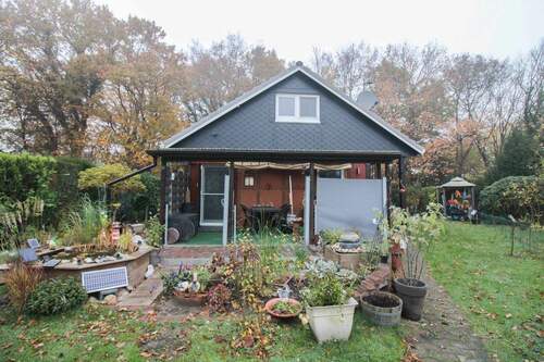 Vorderansicht 2 - Eigenheim mit ca. 72,92 m² wohnlich nutzbarer Fläche, Garten und Stellplatz in ruhiger Randlage