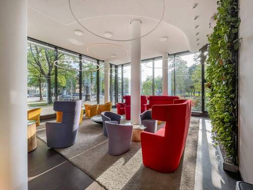 Lounge im Eingangsbereich - 1 Zimmer Etagenwohnung in München