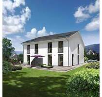 Das schlanke Town & Country Doppelhaus in Niederaula - urbanes Wohnen zweifach genießen