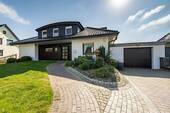 Außen - Dorum Viel Platz für die ganze Familie - charmantes Einfamilienhaus mit Weitblick und großem Garten