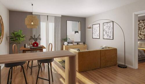 Im Wohnzimmer lässt es sich bestens entspannen - Barrierefreie Eigentumswohnung mit Balkon und bodentiefe Fenster