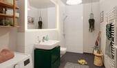 Ein modern gefliestes Badezimmer - Etagenwohnung mit 54,40 m&sup2; in Hasloh zum Kaufen