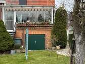 Wintergartenansicht mit Garten - 3 Zimmer Doppelhaushälfte in Rathenow